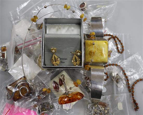 A collection of translucent and faux amber jewellery, some silver-mounted, a pair of Trifari earrings, etc. (Q)